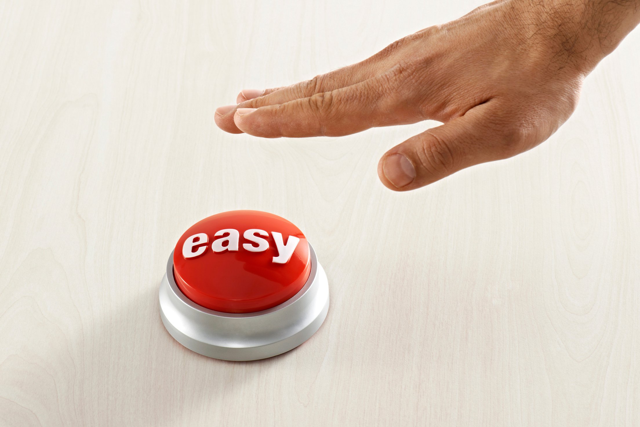 Man Reaching Easy Button